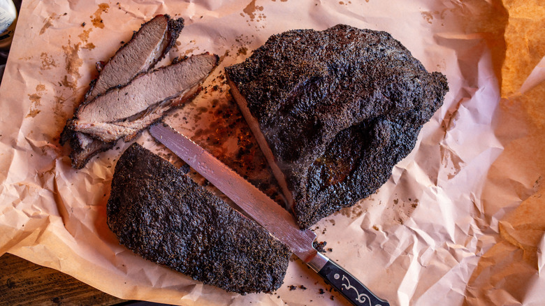 https://www.tastingtable.com/img/gallery/why-it-pays-to-wrap-meat-in-peach-treated-butcher-paper/intro-1669752811.jpg