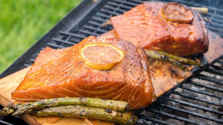 Cedar plank salmon on grill 