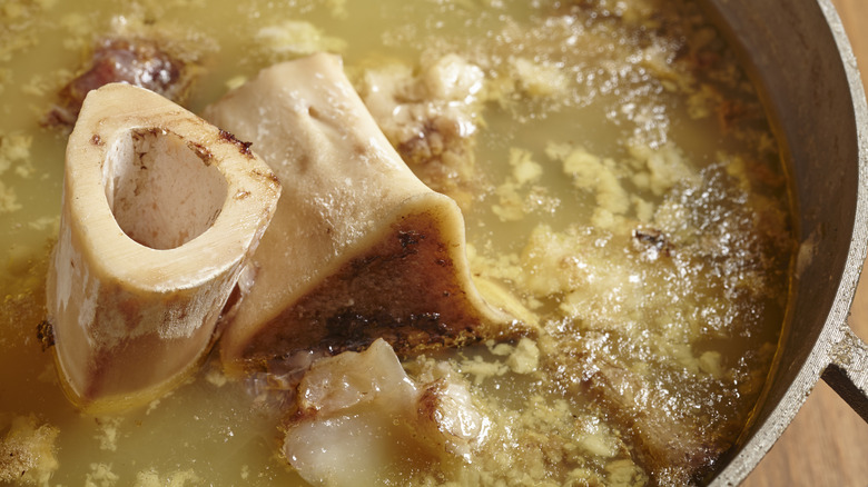 large bones and broth in a pot