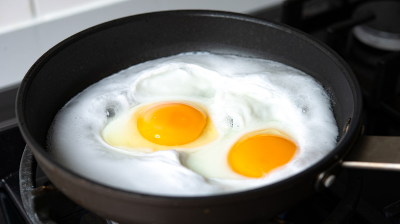 fried eggs in water