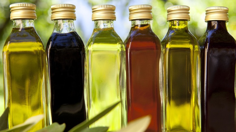 bottles of different vinegars and oil