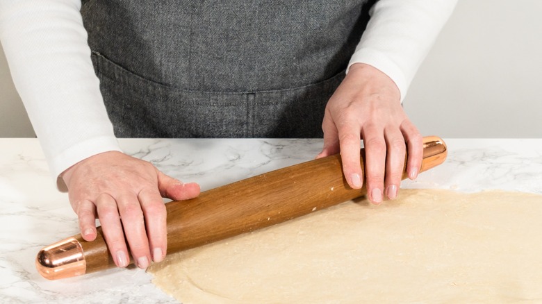 French rolling pin and pastry dough