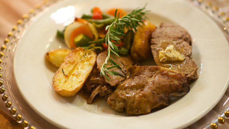 Plated fillet with vegetables at a high-end steakhouse