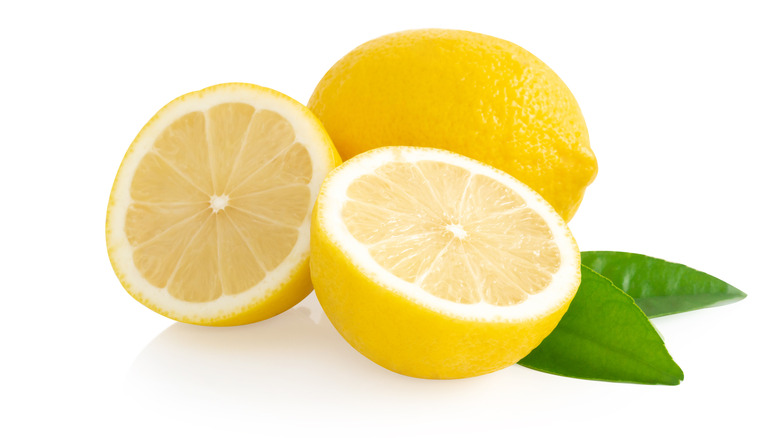 Whole and cut up lemons