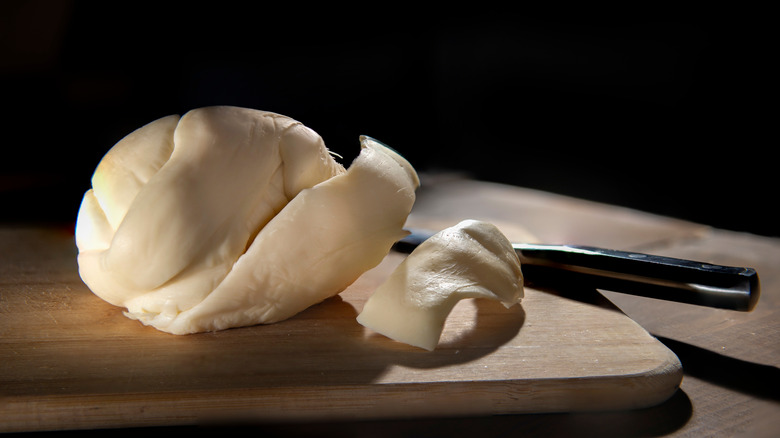 Oaxaca cheese on a cutting board