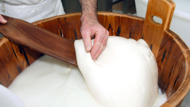 cheese being made by hand