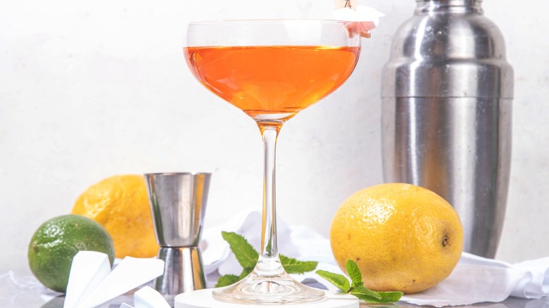 A Paper Plane cocktail with lemons