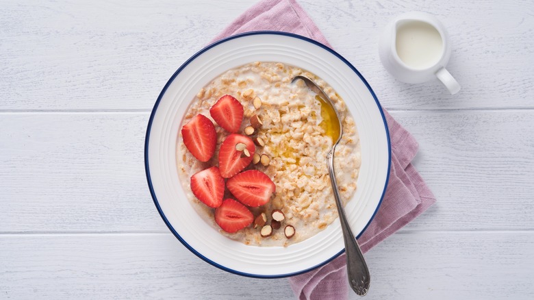 Oatmeal in a bowl with strawberries