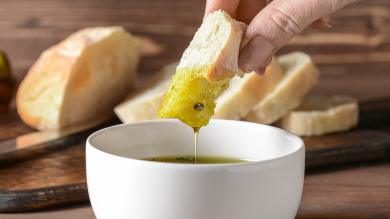 dipping bread in oil