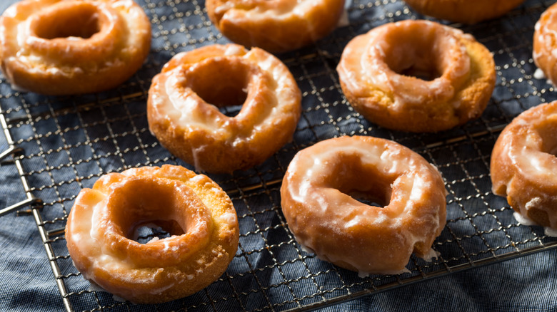 Old fashioned donuts on rack