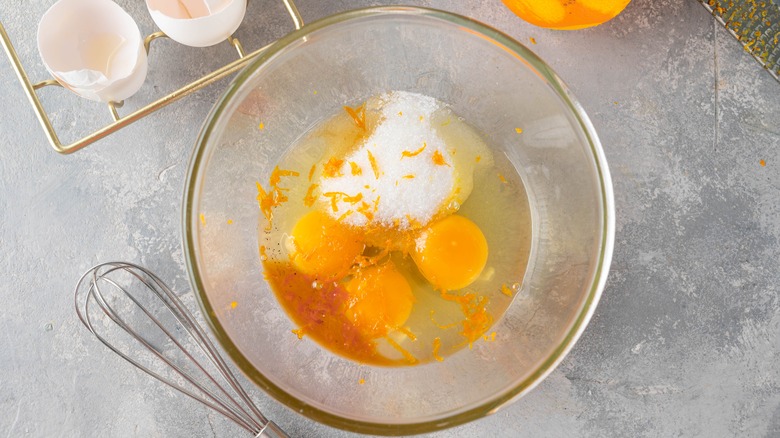 orange zest added to bowl