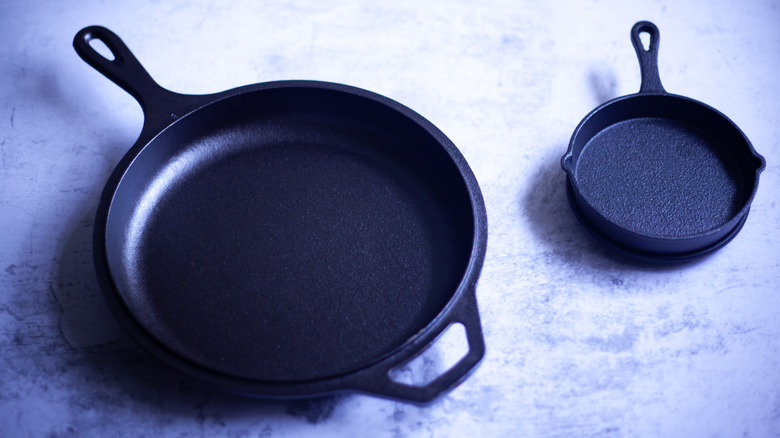 Two cast iron skillets