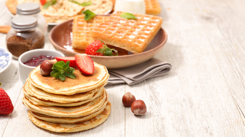 Pancakes and waffles with garnish