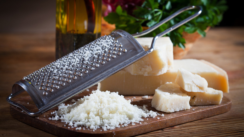 grated Parmesan cheese with a grater
