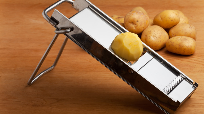 Mandolin slicing potatoes