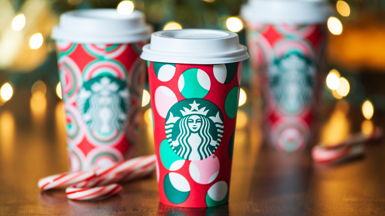 Three Starbucks holiday cups