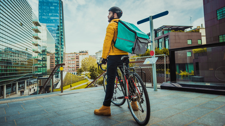 Delivery worker on bicycle 