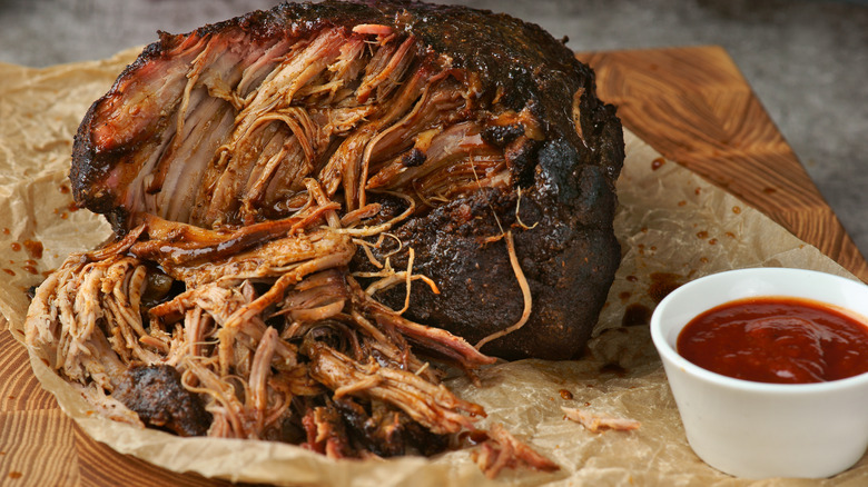 shredded pork sitting on cutting board