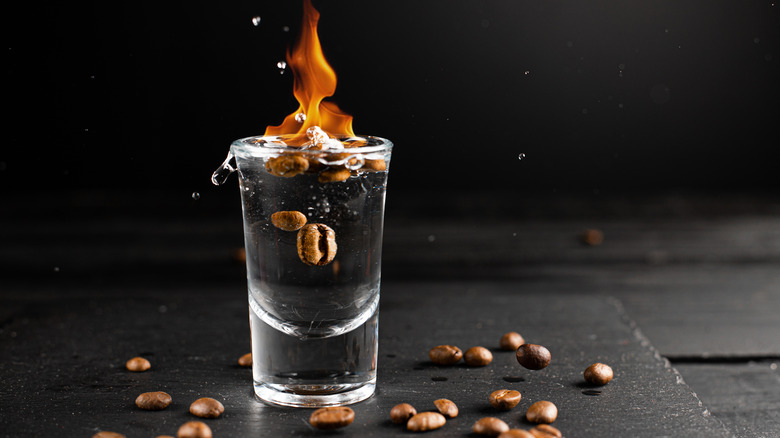 Flaming sambuca with coffee beans