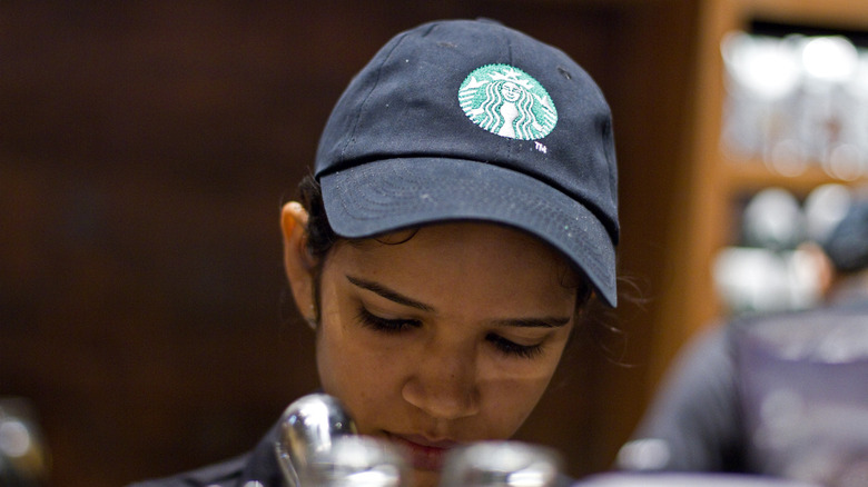 woman working at Starbucks in India 