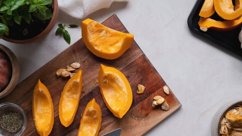 Slices of pumpkin on cutting board