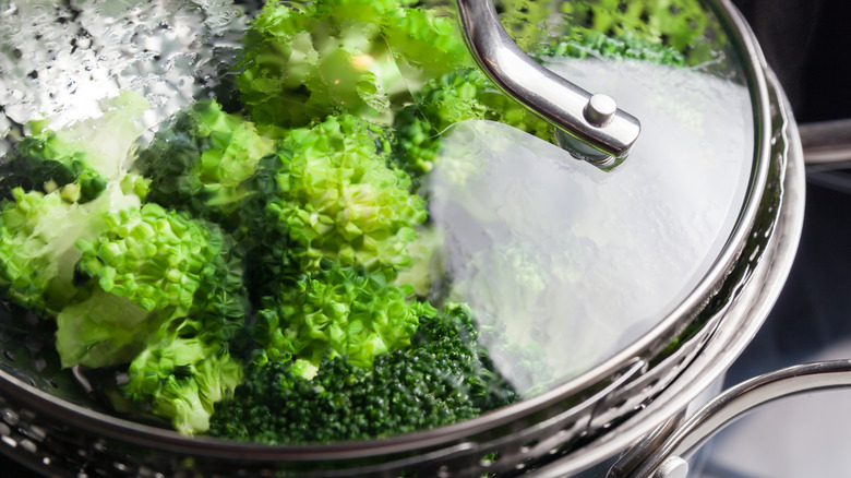 Steaming broccoli in a pot 