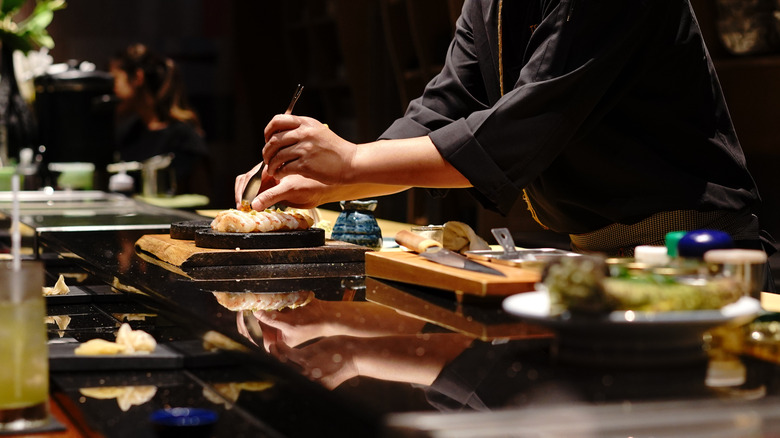 Chef preparing sushi