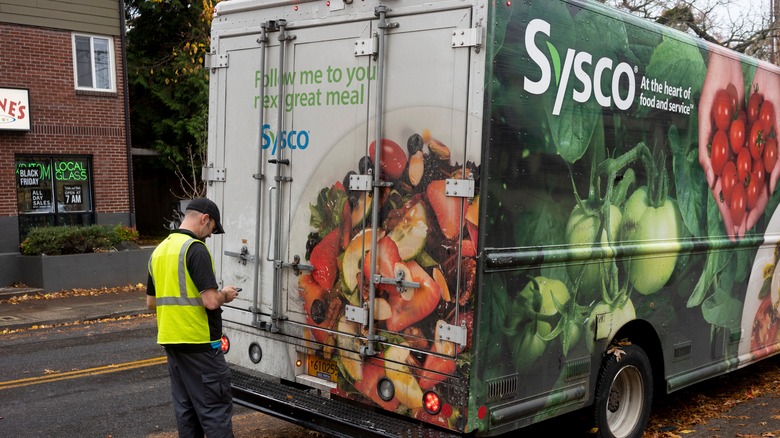 Sysco driver behind truck