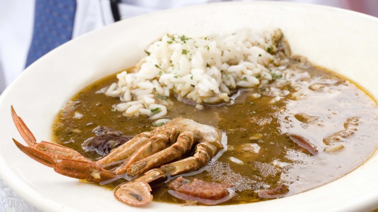 seafood gumbo in white bowl