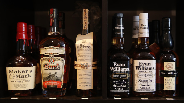 bourbon bottles on retail shelf