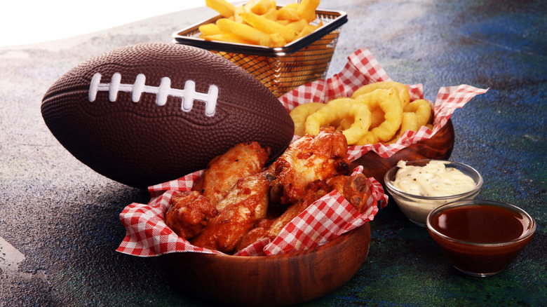 wings in a bowl with a football