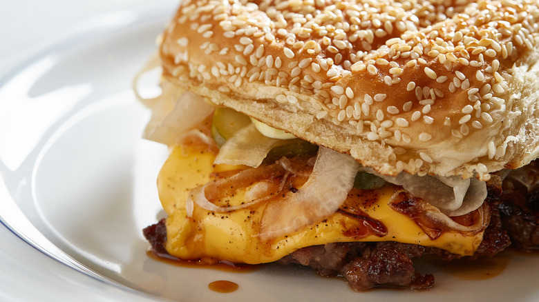 Cheeseburger with charred onions