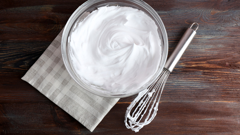 whipped eggs in glass bowl