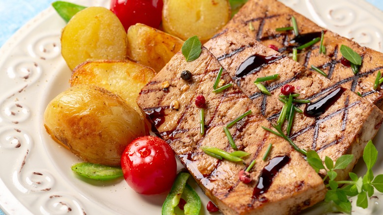 grilled tofu steaks with potatoes and tomatoes