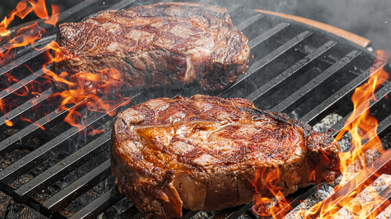 thick steaks on grill