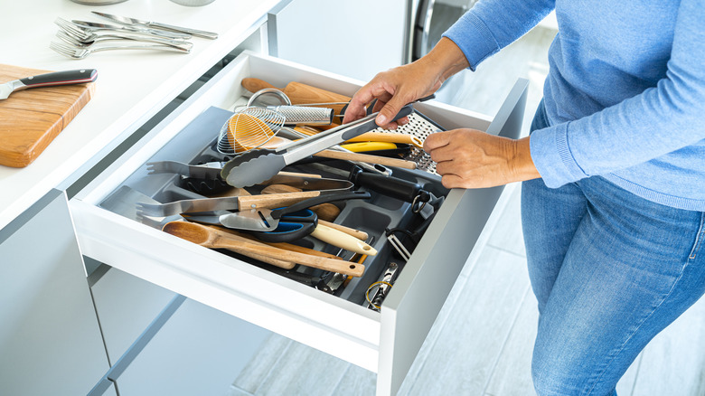 Cluttered kitchen gadget drawer