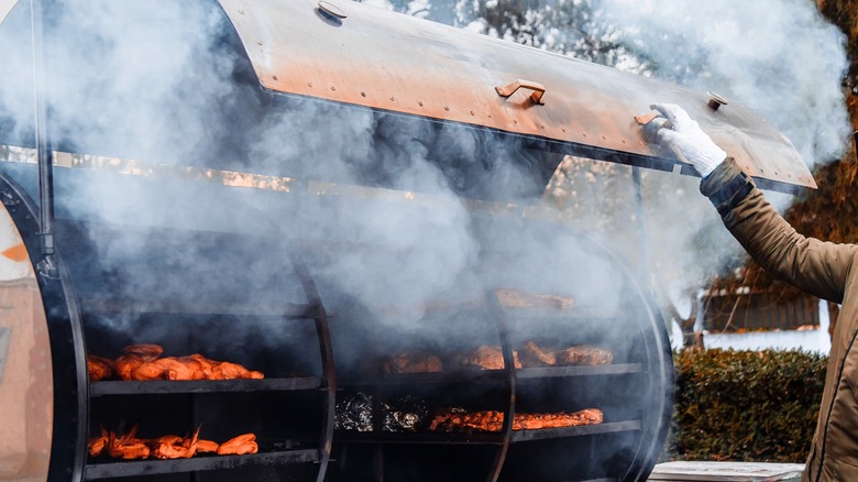 Barbecue smoker with ribs and poultry