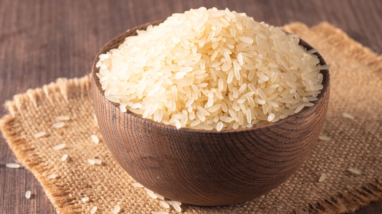 Raw white rice in a bowl