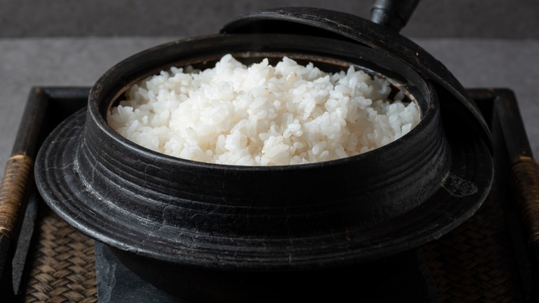Close-up of white rice in an iron pot