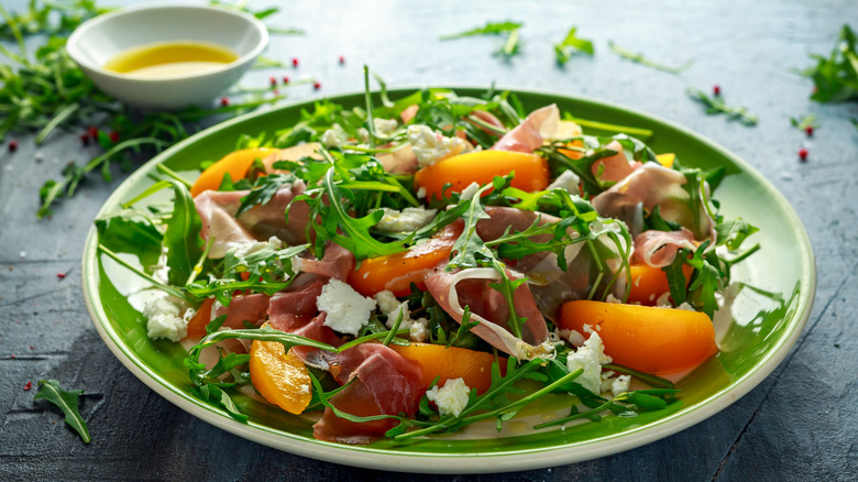 gourmet salad on a white plate