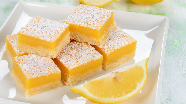 lemon bars on white plate