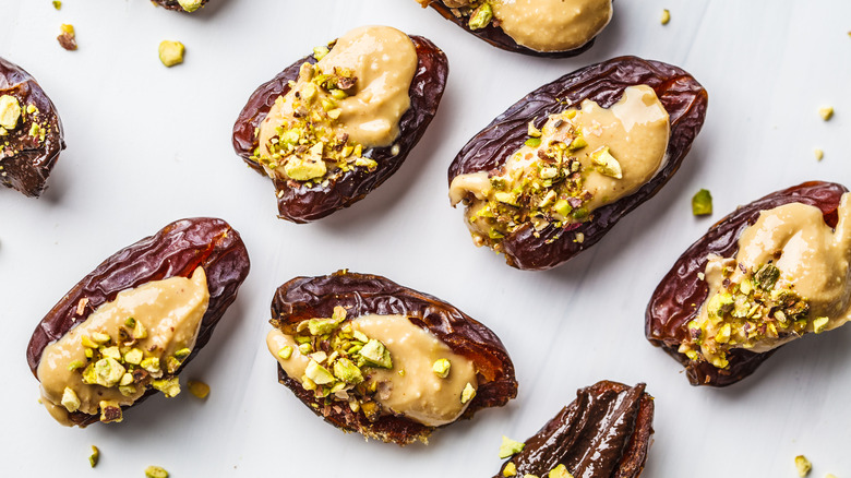 Dates filled with peanut butter and pistachios