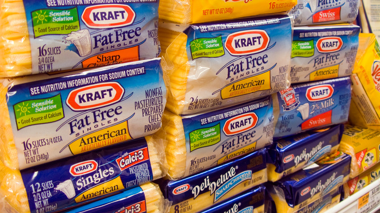 Packages of Kraft cheese slices at a grocery store