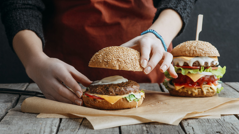 person making burgers