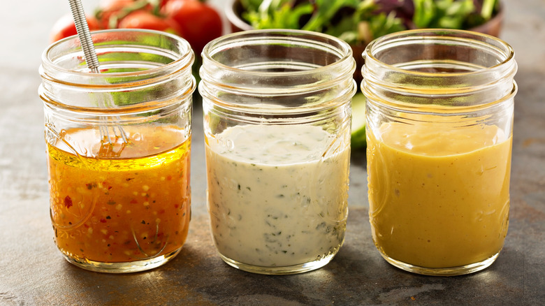 jars of different salad dressing