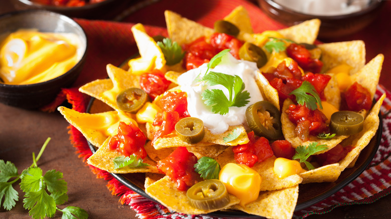 nachos with salsa and jalapenos