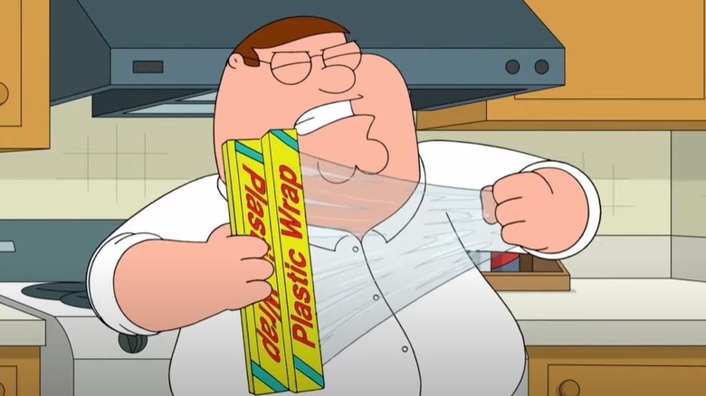 Peter Griffin struggles with plastic wrap