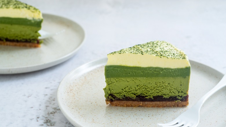 green cheesecake with matcha whipped cream