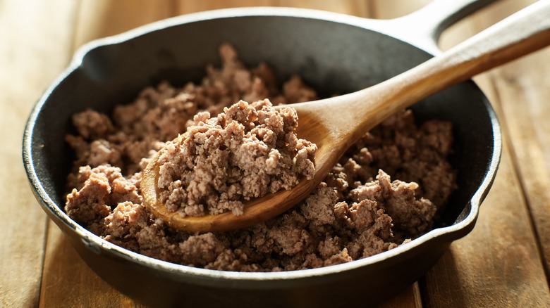 cooked ground beef in a skillet