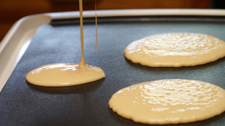 Pancake batter on a griddle